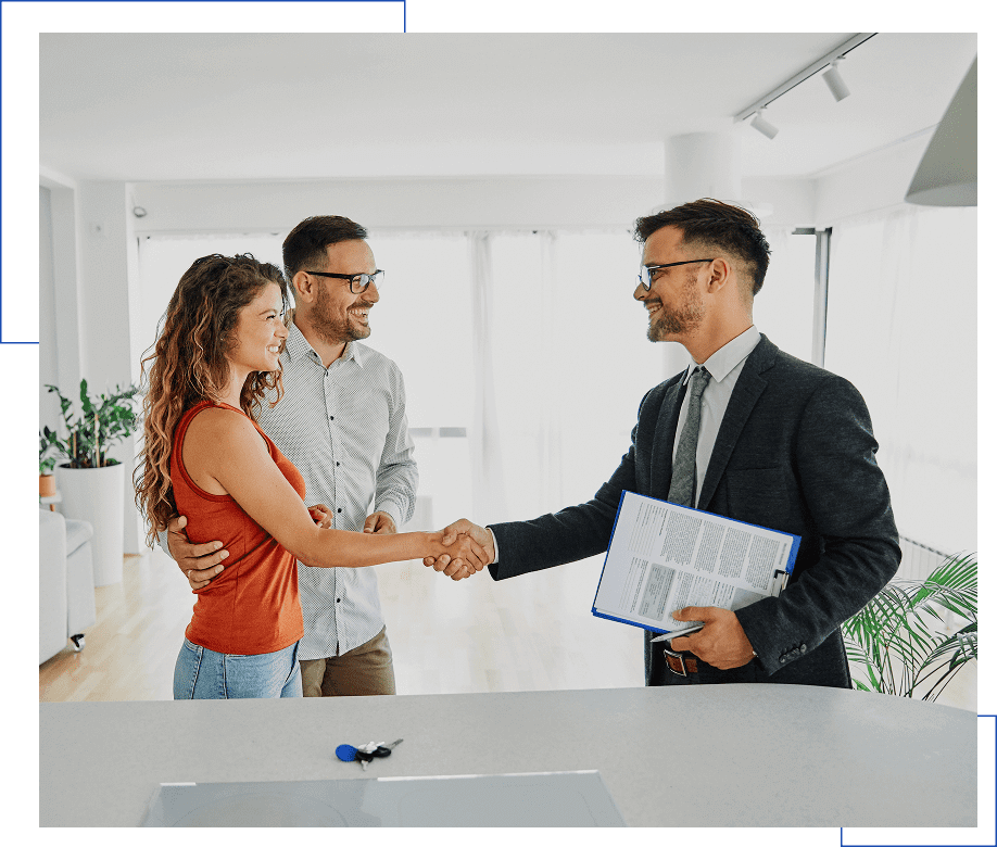 Happy couple finalizing home purchase